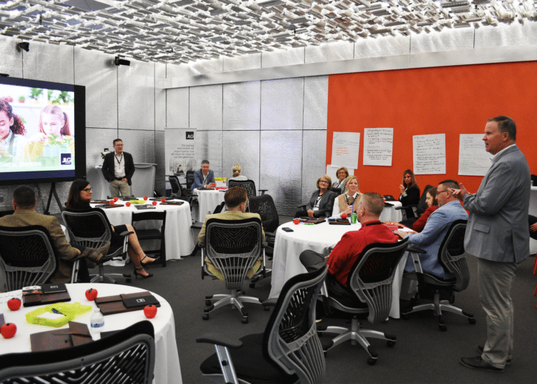 A room full of educators discussing the educational landscape in North Texas.