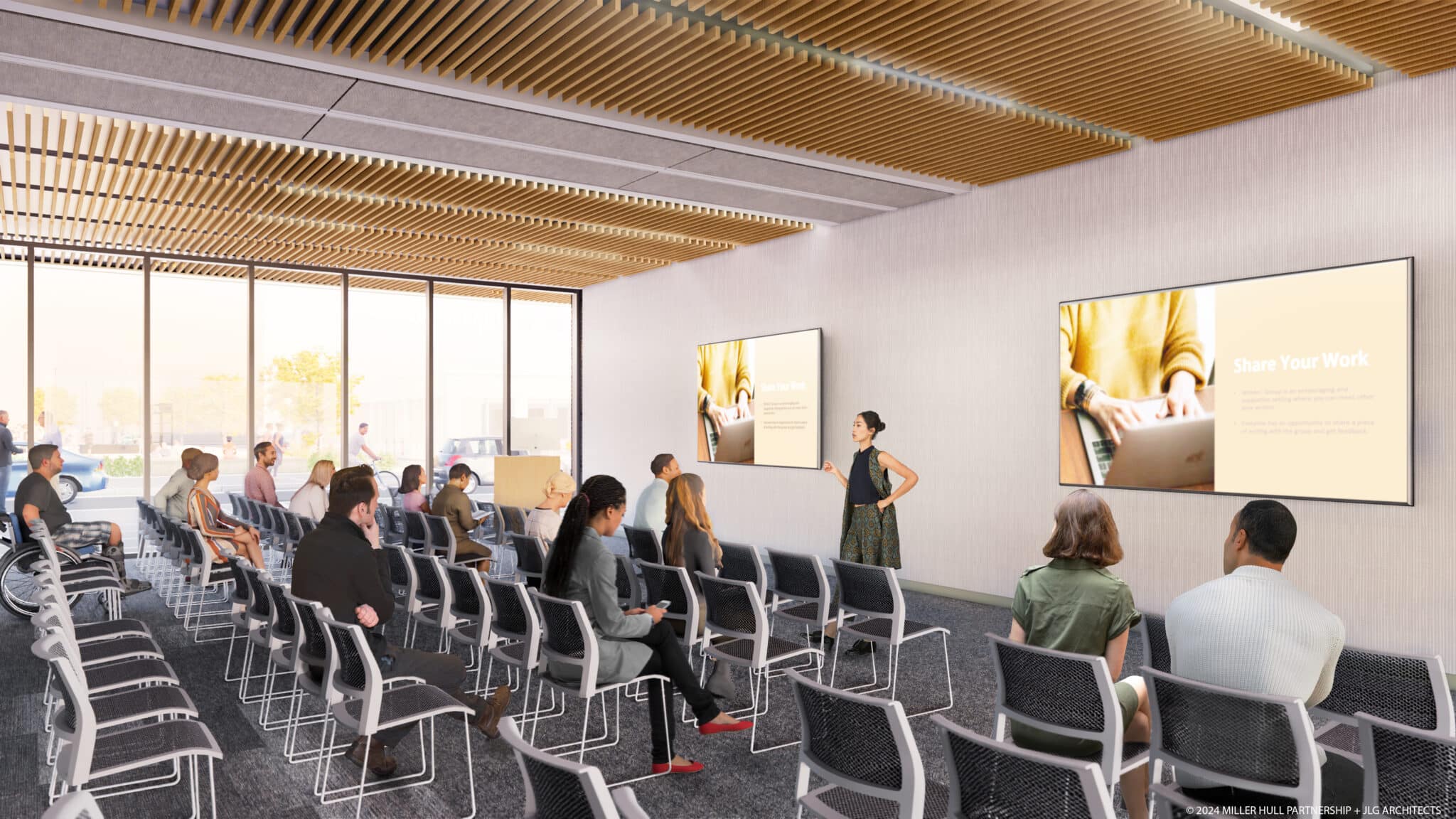 Gathering Room with teacher and people listening to a presentation