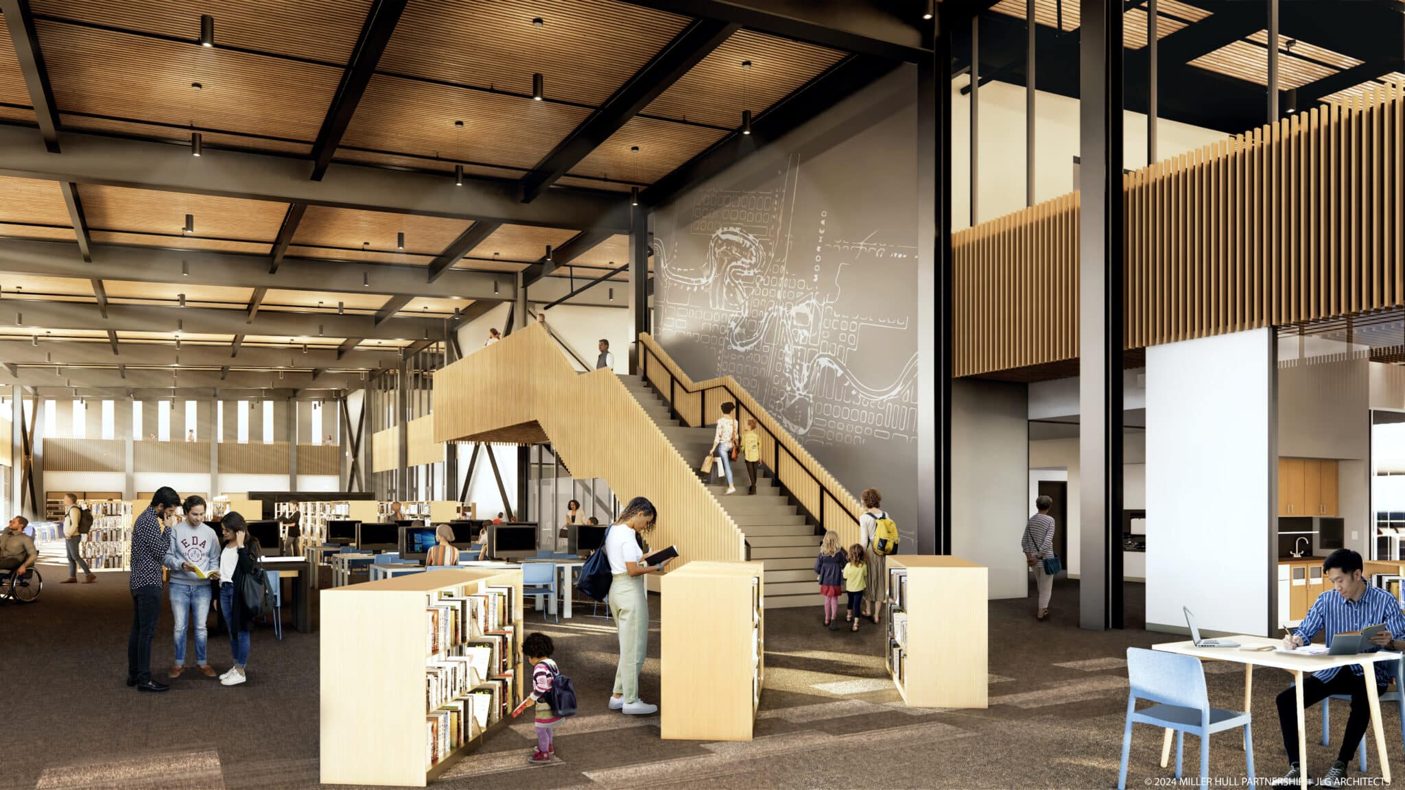 First floor of the library with bookshelves and people